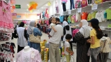 دعوة التجار لتخفيض أسعار ملابس العيد