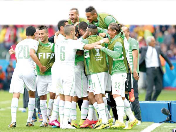 المنتخب الوطني يدخل التاريخ في مونديال البرازيل ويتأهل بسهولة لـ&quot;كان 2015&quot;